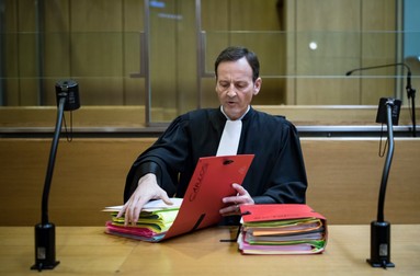 epa05845507 French lawyer Francis Vuillemin, reads case files before the start of the trial of his client Ilich Ramirez Sanchez, also known as 'Carlos the Jackal' , at the Palais de Justice courthouse, in Paris, France, 13 March 2017. Sanchez, the self-styled revolutionary, who was once one of the world's most wanted terrorists, appears in court in France on 13 March 2017 to face charges over a grenade attack on a Paris shop on 15 September 1974 that killed two men and ijuring 34 others. The 63-year-old Venezuelan, was handed a second life sentence in 2011 for four bomb attacks in 1982 and 1983 that killed 11 people and injured over a hundred others. He denied any role in the attacks. EPA/IAN LANGSDON