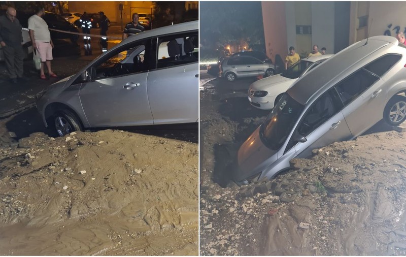 O mașină a intrat în pământ după ce asfaltul din parcarea în care se afla s-a surpat, în București