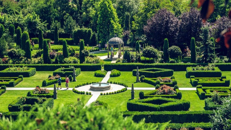 Romania, Hunedoara - 08 15 2023 :Villa House and elegantly hedge mazes, flower displays , water features, arranged in an Italian Renaissance style.I giardini di zoe.