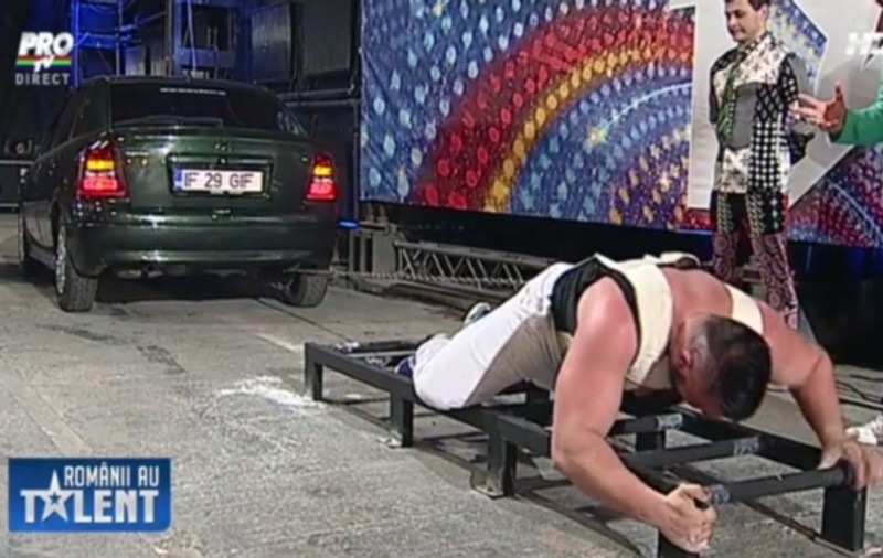 ROMÂNII AU TALENT | Uriaşul Rodion Sukman a tras un tir după el şi A ŢINUT PE LOC O MAŞINĂ
