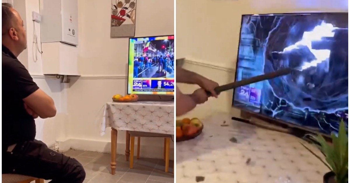 În imagine este ilustrat un bărbat care sparge televizorul cu o bâtă