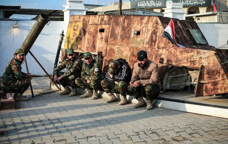 O miliție islamică proiraniană cere formarea unui front unit care să expulzeze forțele americane din Irak
