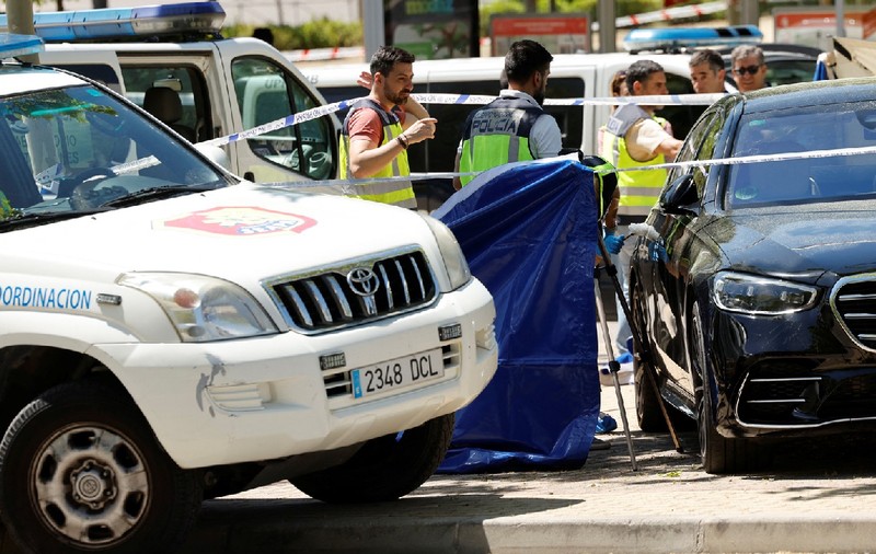 Fost oficial ucrainean împușcat mortal în fața unei școli americane din Madrid. Bărbatul își lăsase copiii la cursuri