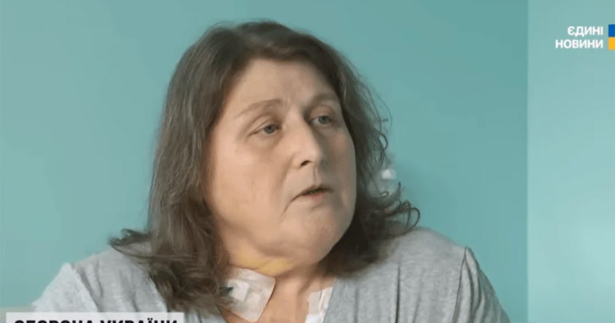 Portretul Irina Rudenko îmbrăcată într-o haină gri după ce a suferit intervenția chirugicală.