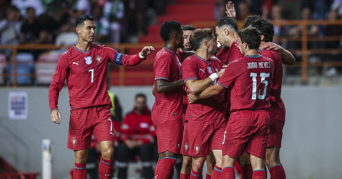 LEIRIA, PORTUGAL - JUNE 10: Pedro Neto of Portugal celebrates scoring Portugal first goal with his teammates during the International Friendly match between Portugal and Nigeria at Estadio Dr Magalhaes Pessoa on June 10, 2026 in Leiria, Portugal. (Photo by Carlos Rodrigues/Getty Images)