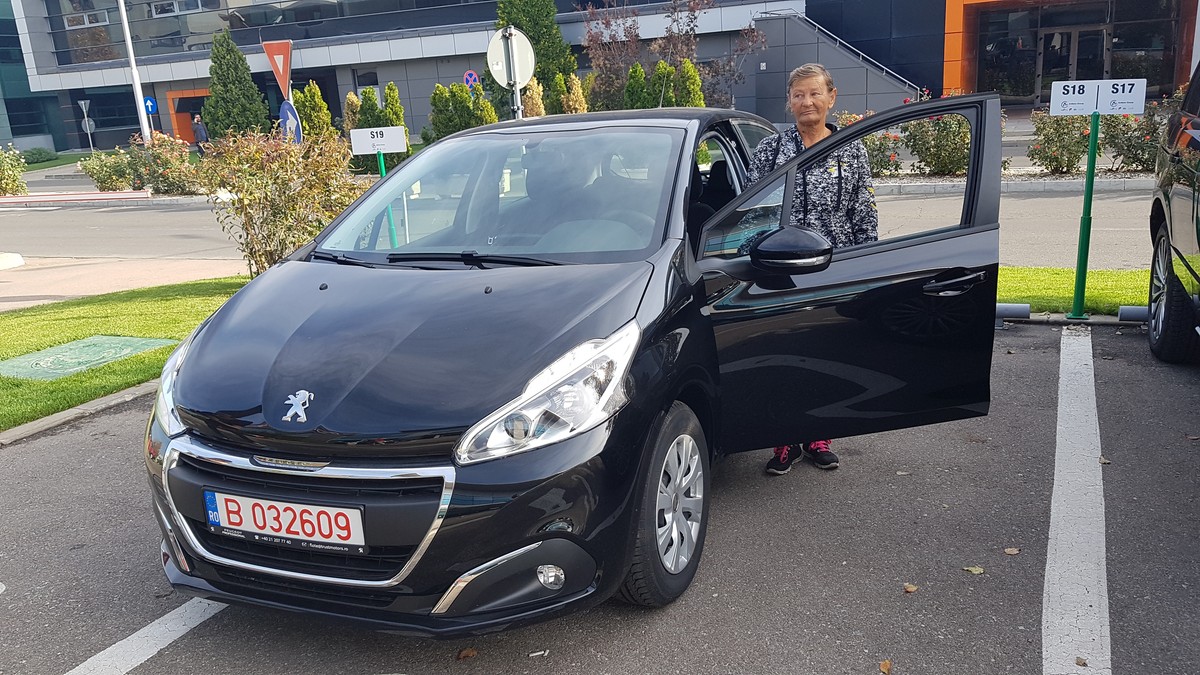 Doamna Elisabeta, câştigătoarea maşinii