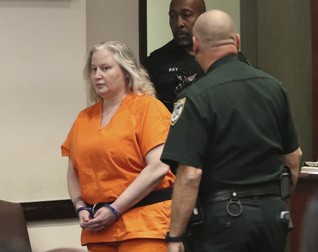 WWE Hall of Famer Tammy Sytch is escorted to the defense table by Volusia Couty Sheriff's bailiffs for her sentencing, Monday, Nov. 27, 2023, at the S. James Foxman Justice Center in Daytona Beach, Fla., for a DUI crash that killed a man in 2022.,Image: 824977021, License: Rights-managed, Restrictions: This content is intended for editorial use only. For other uses, additional clearances may be required. MANDATORY CREDIT POOL PHOTO, Model Release: no