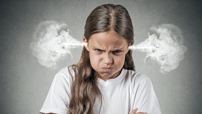 Angry young girl Blowing Steam from ears