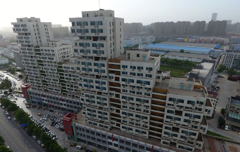 Chinezii își lasă morții în apartamente goale din zgârie-nori, pentru că locurile la cimitir au devenit prea scumpe
