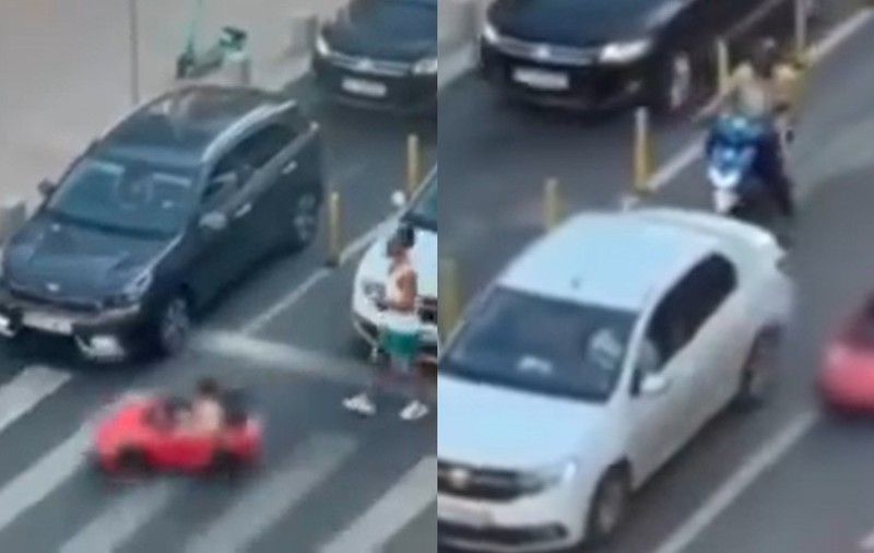 Bărbatul care și-a plimbat copilul cu o mașinuță de jucărie în trafic, pe Calea Victoriei, a fost identificat de polițiști. Ce amendă a primit