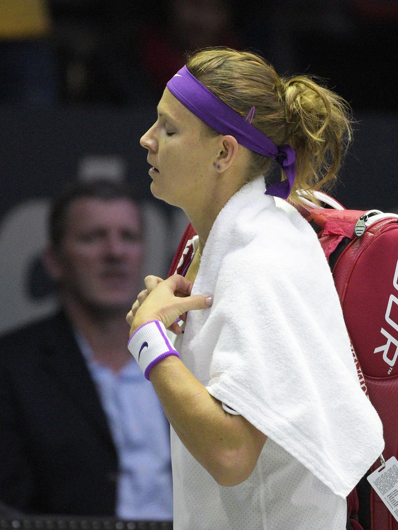 epa04976331 Lucie Safarova of the Czech Republic leaves the court after losing to Andreea Mitu of Romania in their first round match at the WTA Generali Ladies tennis tournament in Linz, Austria, 13 October 2015. EPA/HANS PUNZ