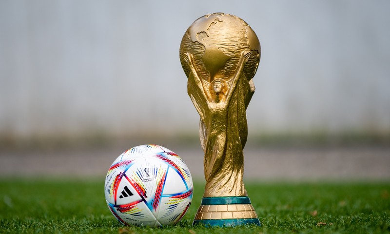 September 3, 2022, Doha, Qatar. FIFA World Cup and official Adidas Al Rihla ball on the green lawn of the stadium.