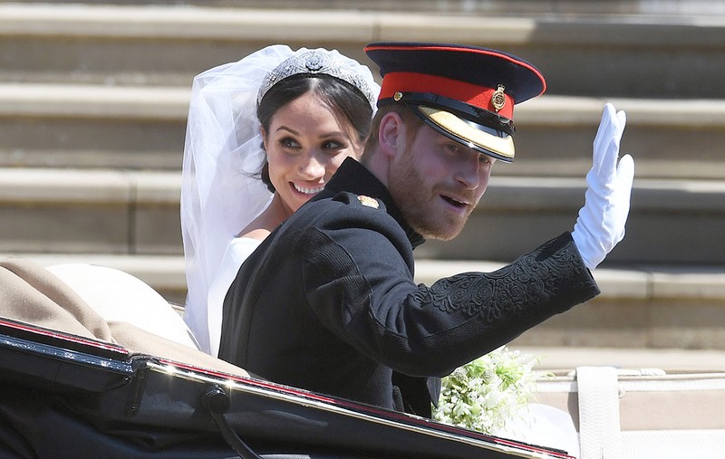 Prințul Harry și Meghan Markle pleacă de la Capela St George din Castelul Windsor după ceremonia nunții lor, în Windsor, Marea Britanie, 19 mai 2018
