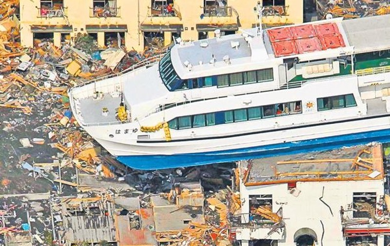 Asta a rămas după tsunami... Mii de morţi sunt descoperiţi zilnic pe coasta de nord-est a Japoniei