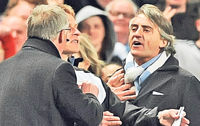 Sir Alex Ferguson, managerul lui Manchester United, la un pas să se bată cu Roberto Mancini, antrenorul lui City