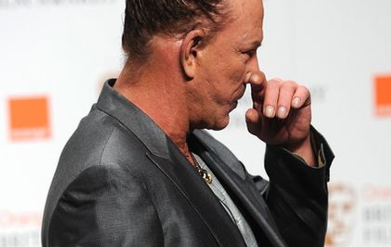 Robert Downey: "Mickey Rourke se uită la poze cu căţeii lui morţi ca să intre mai uşor în rol" 