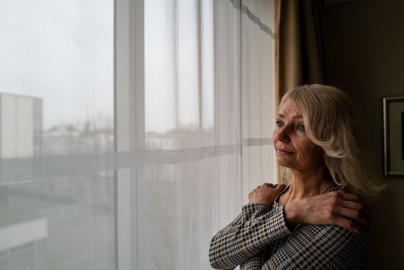 WARSAW, POLAND - NOVEMBER 09: Ukrainian teacher Olena Kurilo, who has become the symbol of the Russia-Ukraine war with her iconic photo -- her head wrapped in a bandage, her face caked with blood after the airstrike -- that Anadolu Agency photojournalist Wolfgang Schwan took on Feb. 24, is seen during an exclusive interview for Anadolu Agency in Warsaw, Poland on November 09, 2022. In the city of Chuhuiv in the Kharkiv Oblast of eastern Ukraine, Anadolu Agency photojournalist Wolfgang Schwan took shots of civilian casualties by Russian missile strikes on Feb. 24 and among his photos, a picture of teacher Olena Kurilo has become one of the most striking images of the conflict. Kurilo and Schwan come together in Warsaw after 9 months. Wolfgang Schwan / Anadolu Agency/ABACAPRESS.COM