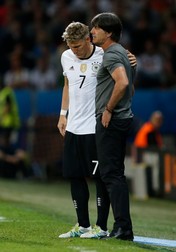 epa05360465 Germany's coach Joachim Loew (R) talks to Bastian Schweinsteiger (L) before he is coming on as a substitue during the UEFA EURO 2016 group C preliminary round match between Germany and Ukraine at Stade Pierre Mauroy in Lille Metropole, France, 12 June 2016. (RESTRICTIONS APPLY: For editorial news reporting purposes only. Not used for commercial or marketing purposes without prior written approval of UEFA. Images must appear as still images and must not emulate match action video footage. Photographs published in online publications (whether via the Internet or otherwise) shall have an interval of at least 20 seconds between the posting.) EPA/LAURENT DUBRULE EDITORIAL USE ONLY