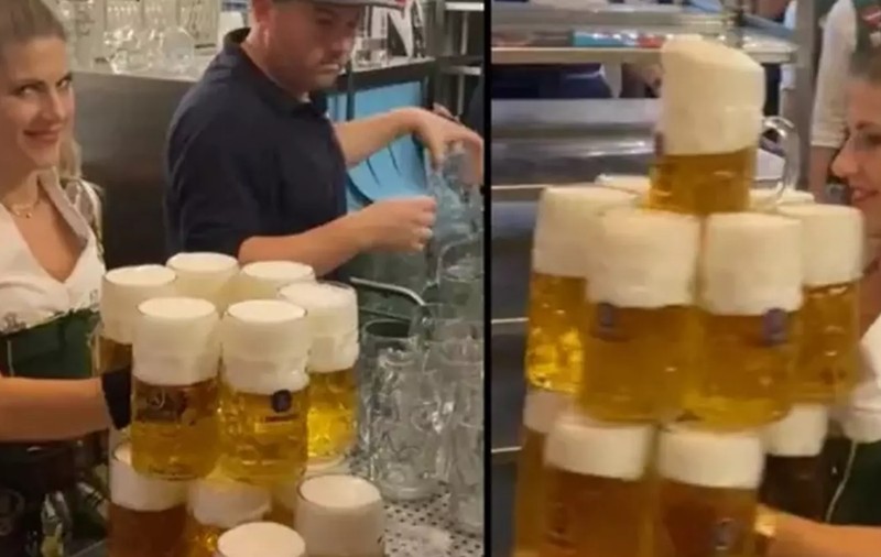 „Câte halbe de bere de un litru pot duce dintr-un foc?”, filmări virale cu „întrecerea” între ospătărițele de la Oktoberfest. Care este recordul mondial