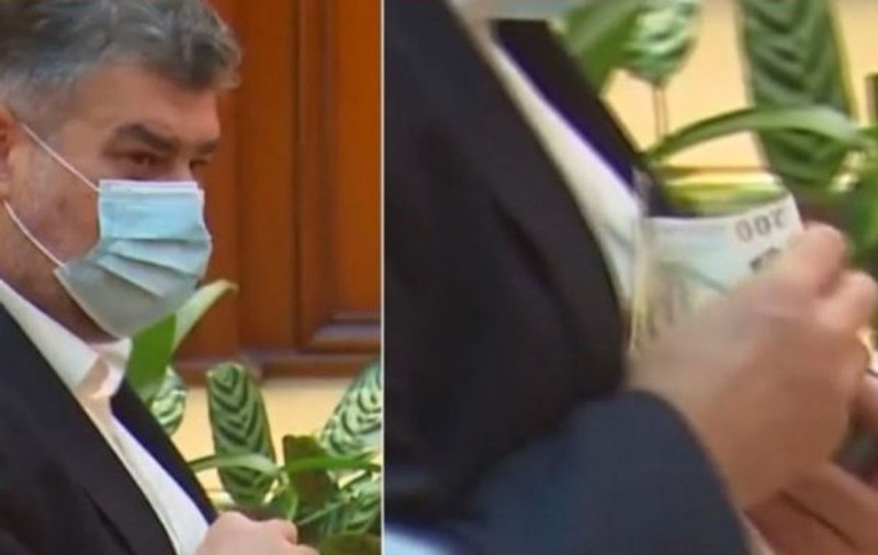 Marcel Ciolacu, surprins din nou cu banii ieșiți din buzunarul de la sacou