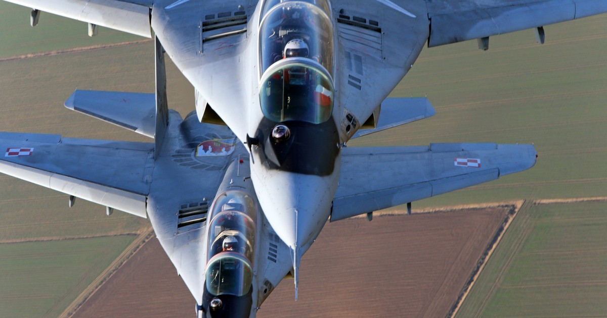 Două avioane MiG-29UB ale Forțelor Aeriene Poloneze zboară deasupra teritoriului național al Poloniei Foto: Profimedia