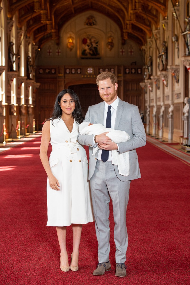 EMBARGOED to 1240 WEDNESDAY MAY 08 2019. The Duke and Duchess of Sussex with their baby son, who was born on Monday morning, during a photocall in St George's Hall at Windsor Castle in Berkshire. May 8, 2019