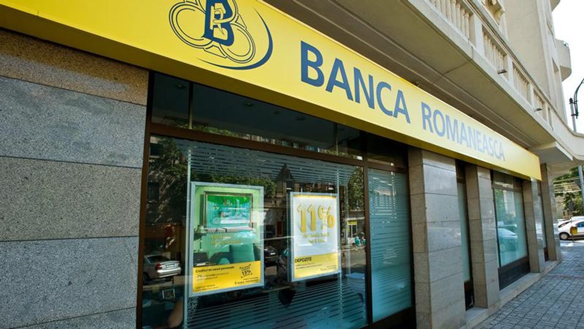 Un român și-a amânat ratele la Banca Românească pentru două luni și s-a trezit că apoi plătește dublu. Sucursală a Băncii Românești cu logo galben