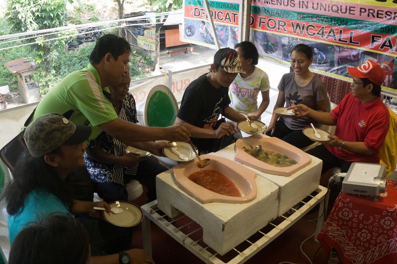 SEMARANG, INDONESIA - JULY 01: Visitors enjoy food served in the toilet, in the Jamban cafe on July 01, 2016 in Semarang, Indonesia. The food at this Jamban cafe is served on a squat toilet as a container. The cafe chairs are made as of toilet sitting. Cafe that has existed since two months is intentionally designed as a campaign concerning about sanitation, which is still a major problem in Indonesia. PHOTOGRAPH BY Dhana Kencana / Barcroft Images London-T:+44 207 033 1031 E:hello@barcroftmedia.com - New York-T:+1 212 796 2458 E:hello@barcroftusa.com - New Delhi-T:+91 11 4053 2429 E:hello@barcroftindia.com www.barcroftmedia.com *** Local Caption *** 02543797