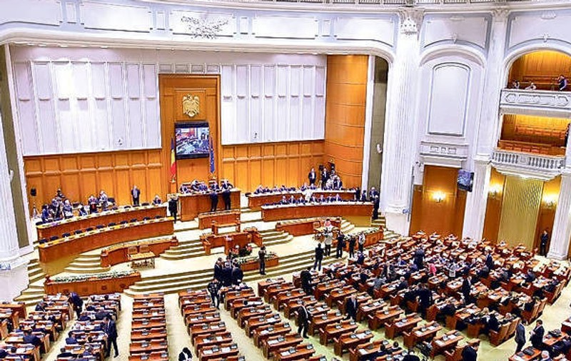 Legea dării în plată, adoptată aproape unanim