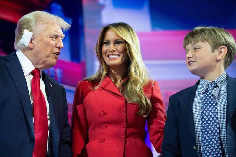 WISCONSIN, UNITED STATES - JULY 18: Former US President Donald Trump (L), and his wife Melania Trump (C) attend the Republican National Convention (RNC) at the Fiserv Forum in Milwaukee, Wisconsin, United States on July 18, 2024. Former US President Donald Trump formally accepted the Republican Party’s nomination as its presidential candidate in his first speech since surviving an attempted assassination. During a campaign rally in Pennsylvania on Saturday, a lone 20-year-old gunman opened fire on Trump during the campaign rally, striking him in his right ear and critically injuring two rally goers and killing a third. Jacek Boczarski / Anadolu/ABACAPRESS.COM