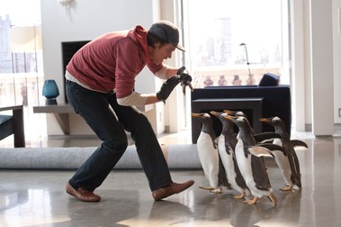 Jim Carrey în “Pinguinii domnului Popper”