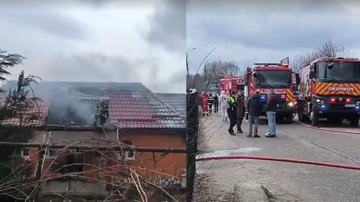 Casa procurorului Mitrana a fost cuprinsă de flăcări, pmpierii incearcă să stingă focul cu mai multe autospeciale, oamenii stau să privesc