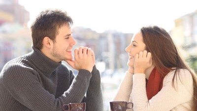 Couple dating and flirting looking each other