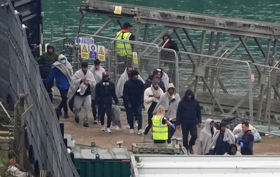 A group of people thought to be migrants are brought in to Dover, Kent, from the RNLI Dungeness Lifeboat following a small boat incident in the Channel. Picture date: Wednesday October 30, 2024.,Image: 928273871, License: Rights-managed, Restrictions: , Model Release: no