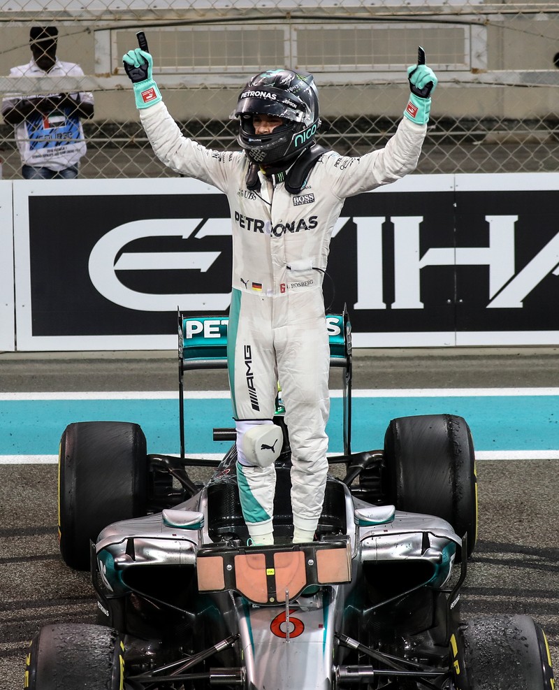 epa05649605 German Formula One driver Nico Rosberg of Mercedes AMG GP celebrates winning the Formula One World Championship 2016 after his second place in the Abu Dhabi Formula One Grand Prix at Yas Marina Circuit in Abu Dhabi, United Arab Emirates, 27 November 2016. EPA/SRDJAN SUKI