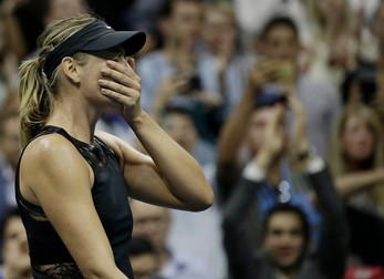 epa06169515 Maria Sharapova of Russia reacts after upsetting number 2 seed Simona Halep of Romania on the first day of the US Open Tennis Championships at the USTA National Tennis Center in Flushing Meadows, New York, USA, 28 August 2017. The US Open runs through September 10. EPA-EFE/PETER FOLEY
