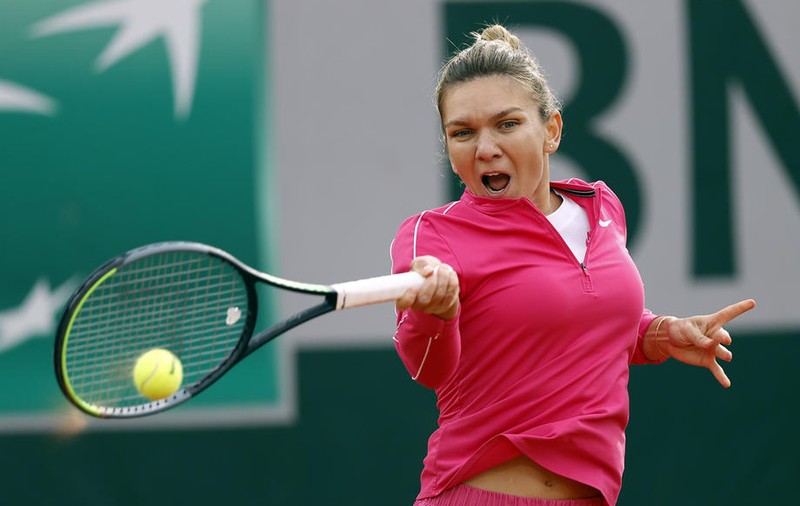 Simona Halep s-a calificat în ”optimile” turneului de la Roland Garros după un triumf entuziasmant în fața Amandei Anisimova