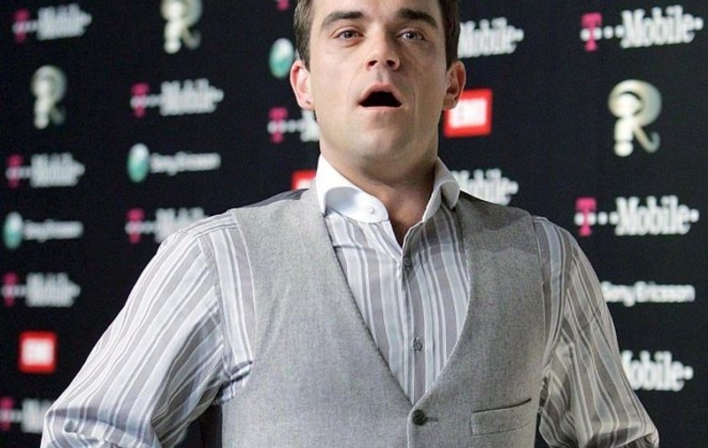 Robbie Williams, îngrozit de gripa porcină