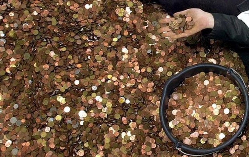 Un bancher german a fost nevoit să numere 2,5 tone de monede