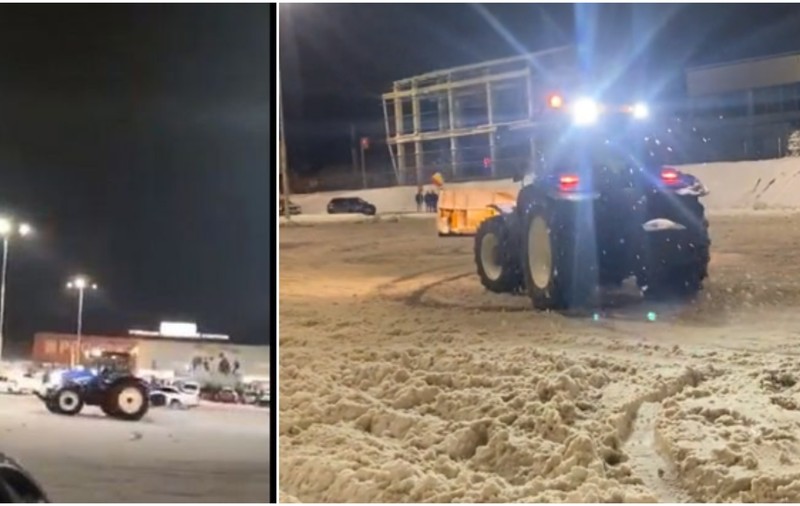 Drifturi cu un utilaj de deszăpezire în parcarea unui supermarket din Bacău