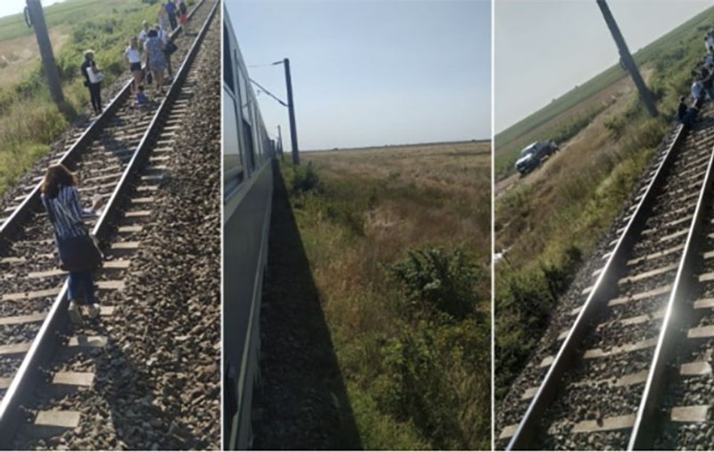 Un tren Târgu Jiu - București, blocat în câmp mai bine de trei ore. Călătorii au așteptat în caniculă pornirea lui