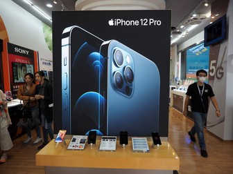 epa08767261 A sign advertising iPhone 12 Pro in a mobile store in Taipei, Taiwan, 23 October 2020. On 23 October, Apple launched the iPhone 12 and iPhone 12 Pro in Taiwan. EPA-EFE/DAVID CHANG