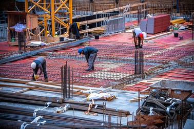 Muncitori în construcții pe șantierele din Germania