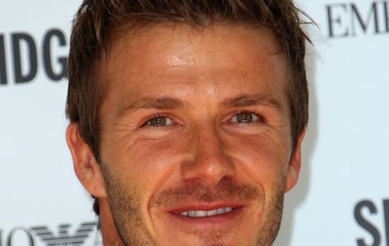 Beckham a primit despăgubiri de la un tabloid