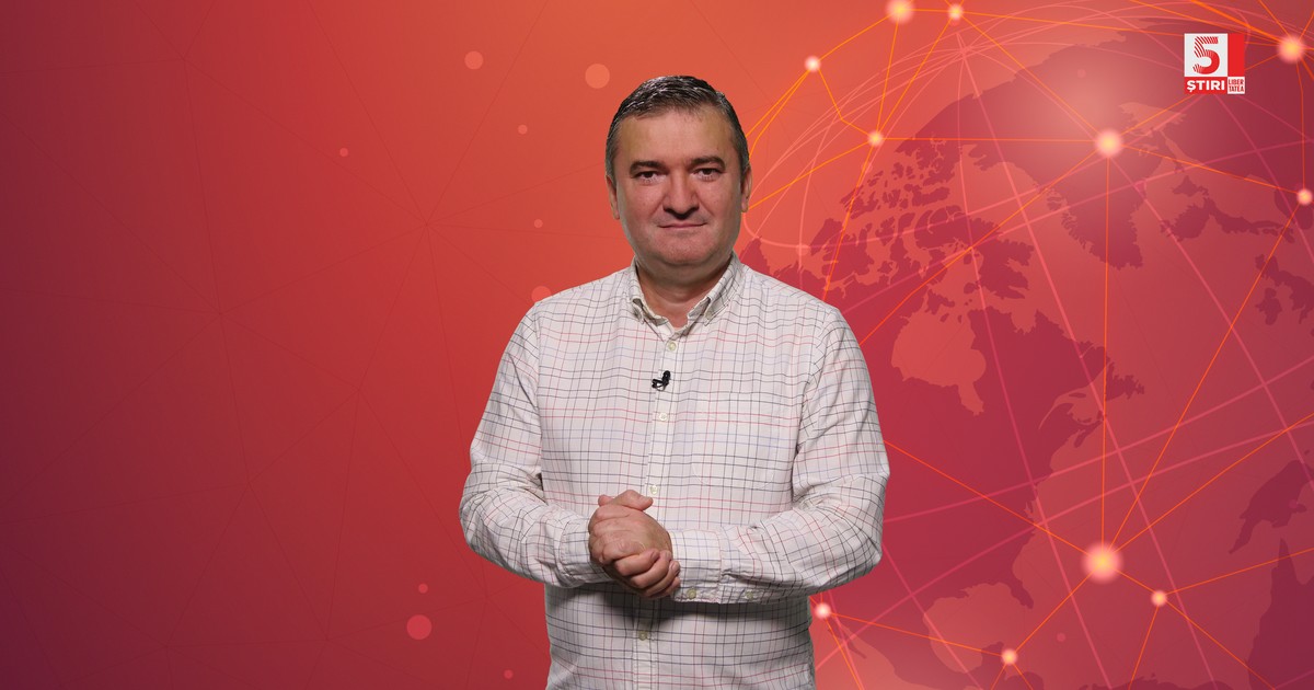 Dorin Chioțea in camasa alba, in picioare