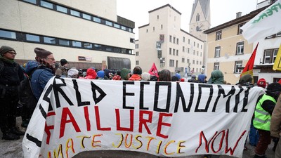 Activists in Davos stage a protest against World Economic Forum