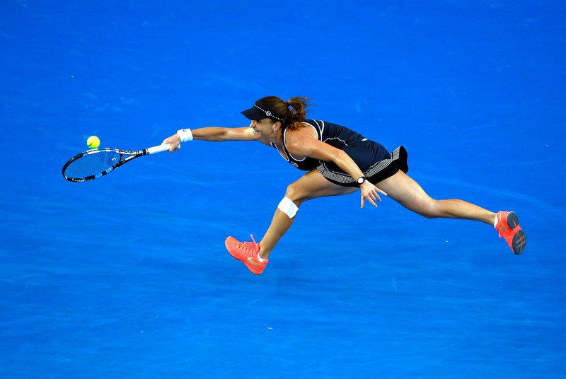 epa05115466 Alexandra Dulgheru of Romania in action against Angelique Kerber of Germany during their second round match at the Australian Open Grand Slam tennis tournament in Melbourne, Australia, 21 January 2016. EPA/MAST IRHAM