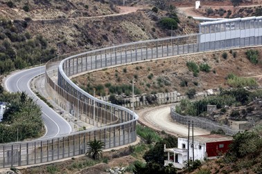 This overview shows the border fence between Spain's African enclave of Ceuta and Morocco near Fnideq in the country's north on September 30, 2024.,Image: 914152727, License: Rights-managed, Restrictions: , Model Release: no
