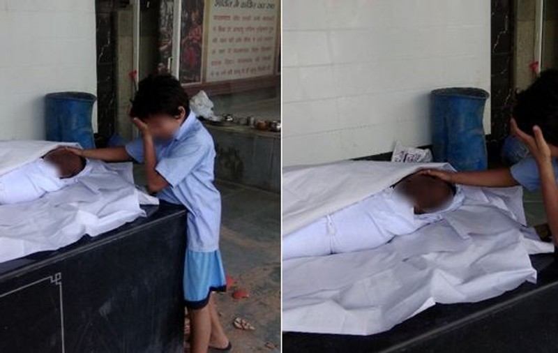 Imaginea cutremurătoare cu un copil care plânge lângă tatăl său mort. Oamenii au făcut un gest impresionant după ce au aflat povestea