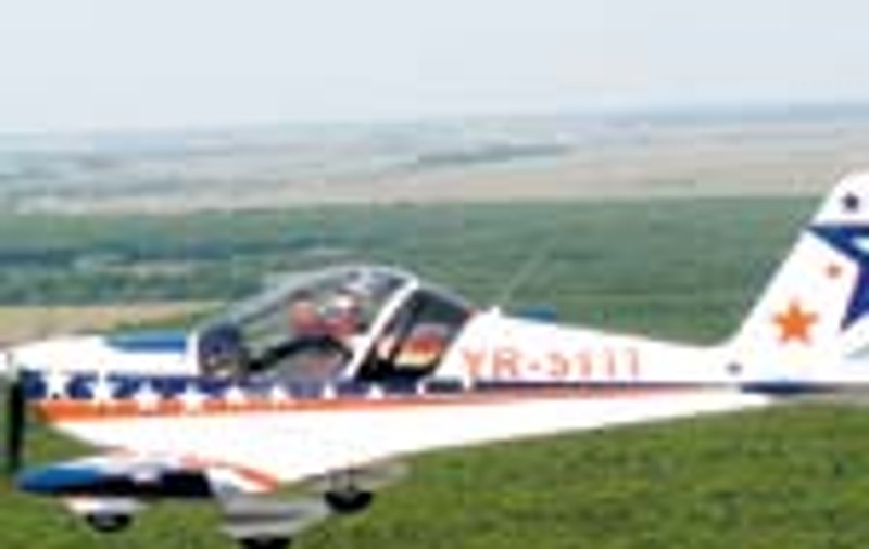 A plimbat o batrana cu avionul